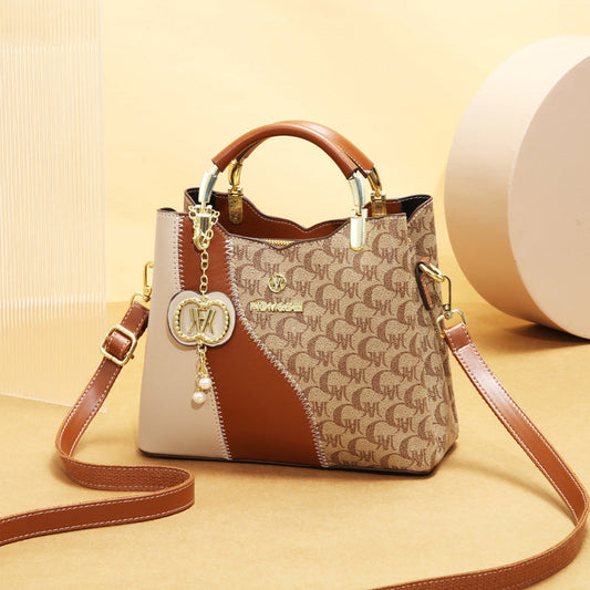 Stylová potištěná taška typu bucket bag